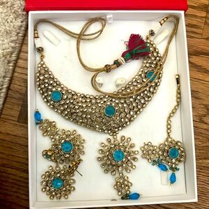 Necklace, earrings and hair piece